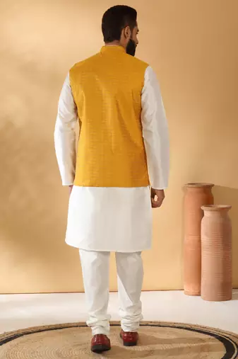 Silk blend cream kurta and churidar with jacquard geometric mustard nehru jacket