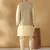 Silk blend beige kurta and churidar with jacquard geometric nehru jacket
