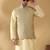 Silk blend beige kurta and churidar with jacquard geometric nehru jacket