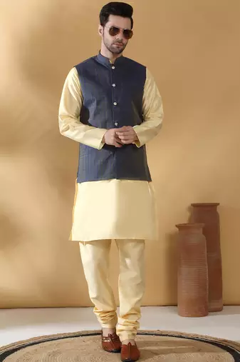 Silk blend beige kurta and churidar with jacquard geometric blue nehru jacket