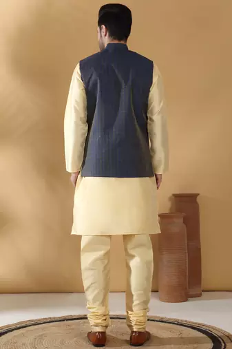 Silk blend beige kurta and churidar with jacquard geometric blue nehru jacket