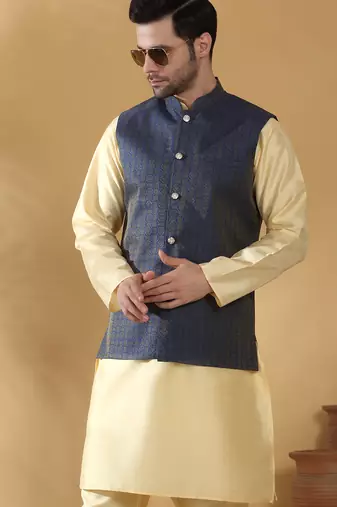 Silk blend beige kurta and churidar with jacquard geometric blue nehru jacket