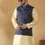 Silk blend beige kurta and churidar with jacquard geometric blue nehru jacket