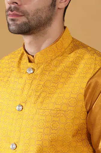 Silk blend mustard kurta and churidar with jacquard geometric nehru jacket