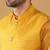Silk blend mustard kurta and churidar with jacquard geometric nehru jacket
