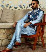 Silk blend solid sky blue kurta and churidar with floral nehru jacket