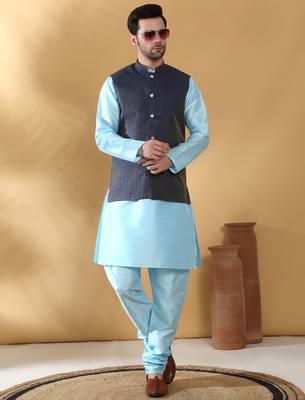 Silk blend blue kurta and churidar with jacquard geometric blue nehru jacket 1
