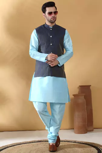 Silk blend blue kurta and churidar with jacquard geometric blue nehru jacket