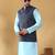 Silk blend blue kurta and churidar with jacquard geometric blue nehru jacket