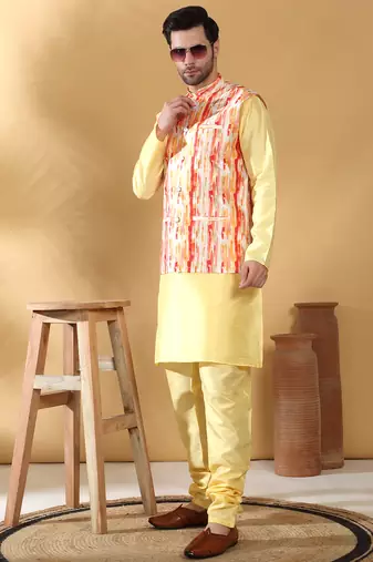 Silk blend lime yellow kurta and churidar with tie-dye orange nehru jacket