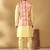 Silk blend lime yellow kurta and churidar with tie-dye orange nehru jacket