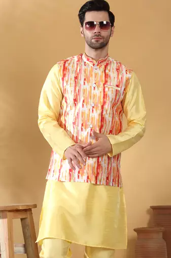 Silk blend lime yellow kurta and churidar with tie-dye orange nehru jacket