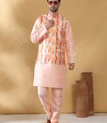 Silk blend peach kurta and churidar with tie-dye orange nehru jacket
