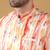 Silk blend peach kurta and churidar with tie-dye orange nehru jacket