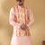 Silk blend peach kurta and churidar with tie-dye orange nehru jacket