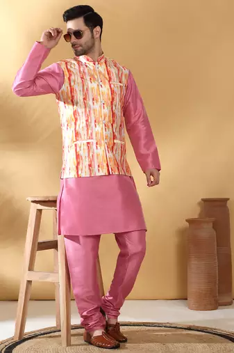 Silk blend pink kurta and churidar with tie-dye orange nehru jacket