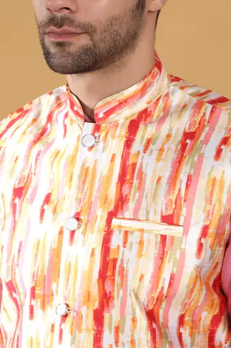 Silk blend pink kurta and churidar with tie-dye orange nehru jacket