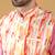 Silk blend pink kurta and churidar with tie-dye orange nehru jacket