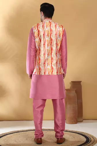 Silk blend pink kurta and churidar with tie-dye orange nehru jacket
