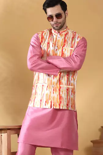 Silk blend pink kurta and churidar with tie-dye orange nehru jacket