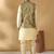 Silk bleand beige kurta churidar with abstract printed green nehru jacket