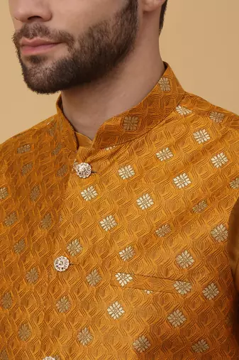 Men's mustard kurta and churidar with jacquard ethnic nehru jacket