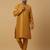 Men's mustard kurta and churidar with jacquard floral nehru jacket