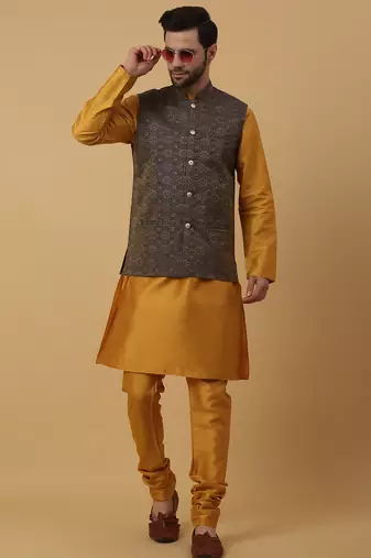 Men's mustard kurta and churidar with jacquard ethnic motifs printed nehru jacket