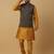 Men's mustard kurta and churidar with jacquard ethnic motifs printed nehru jacket