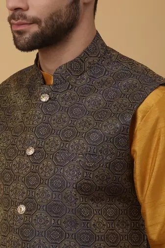 Men's mustard kurta and churidar with jacquard ethnic motifs printed nehru jacket