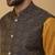 Men's mustard kurta and churidar with jacquard ethnic motifs printed nehru jacket