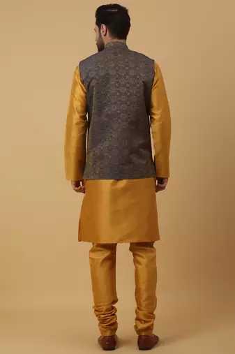 Men's mustard kurta and churidar with jacquard ethnic motifs printed nehru jacket
