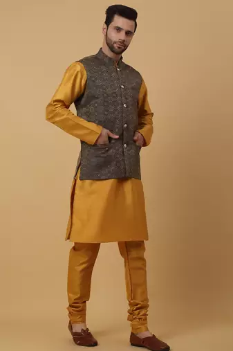 Men's mustard kurta and churidar with jacquard ethnic motifs printed nehru jacket