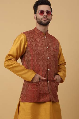 Men's mustard kurta and churidar with jacquard ethnic motifs printed nehru jacket