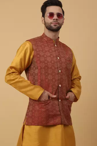 Men's mustard kurta and churidar with jacquard ethnic motifs printed nehru jacket