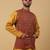 Men's mustard kurta and churidar with jacquard ethnic motifs printed nehru jacket