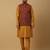 Men's mustard kurta and churidar with jacquard ethnic motifs printed nehru jacket