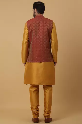 Men's mustard kurta and churidar with jacquard ethnic motifs printed nehru jacket