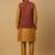 Men's mustard kurta and churidar with jacquard ethnic motifs printed nehru jacket