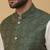 Men's cream kurta and churidar with jacquard ethnic motifs printed nehru jacket
