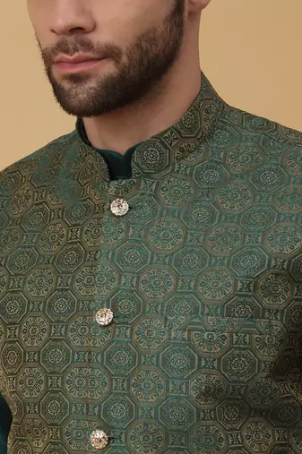 Men's green kurta and churidar with jacquard ethnic motifs printed nehru jacket