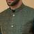 Men's green kurta and churidar with jacquard ethnic motifs printed nehru jacket