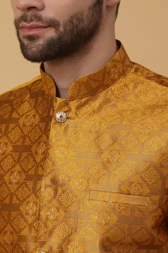 Men's mustard kurta and churidar with jacquard floral nehru jacket