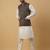 Men's cream kurta and churidar with jacquard ethnic motifs printed nehru jacket