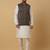 Men's cream kurta and churidar with jacquard ethnic motifs printed nehru jacket
