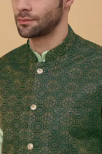 Men's sea green kurta and churidar with jacquard ethnic motifs printed nehru jacket