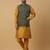 Men's mustard kurta and churidar with jacquard ethnic motifs printed nehru jacket