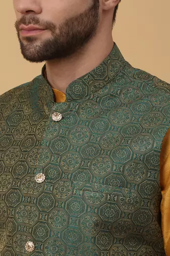 Men's mustard kurta and churidar with jacquard ethnic motifs printed nehru jacket