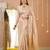 beige handloom tissue saree with designer blouse