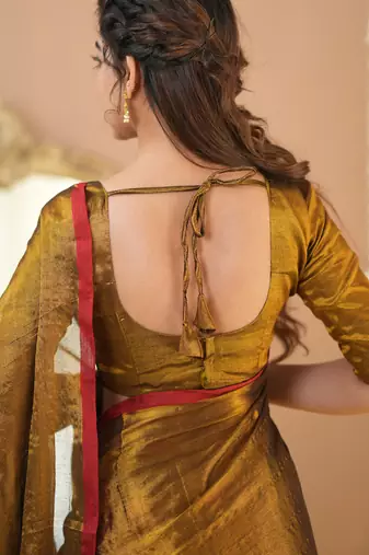 gold handloom tissue saree with designer blouse